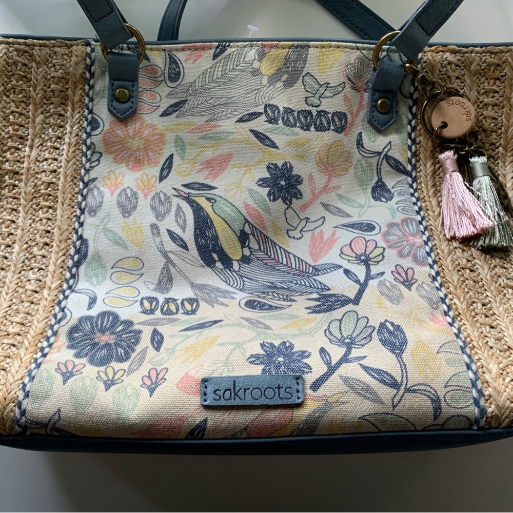 Sakroots straw and canvas shoulder bag.